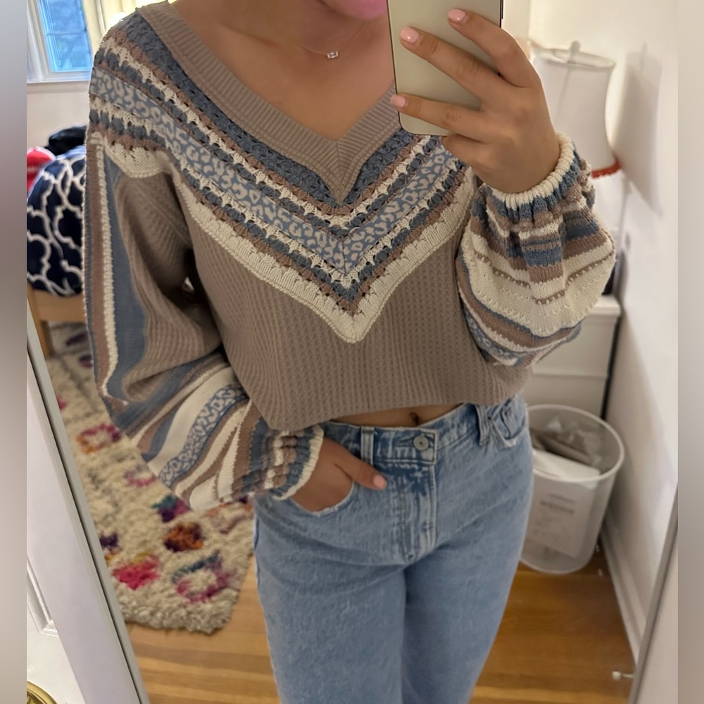 Tan sweater.